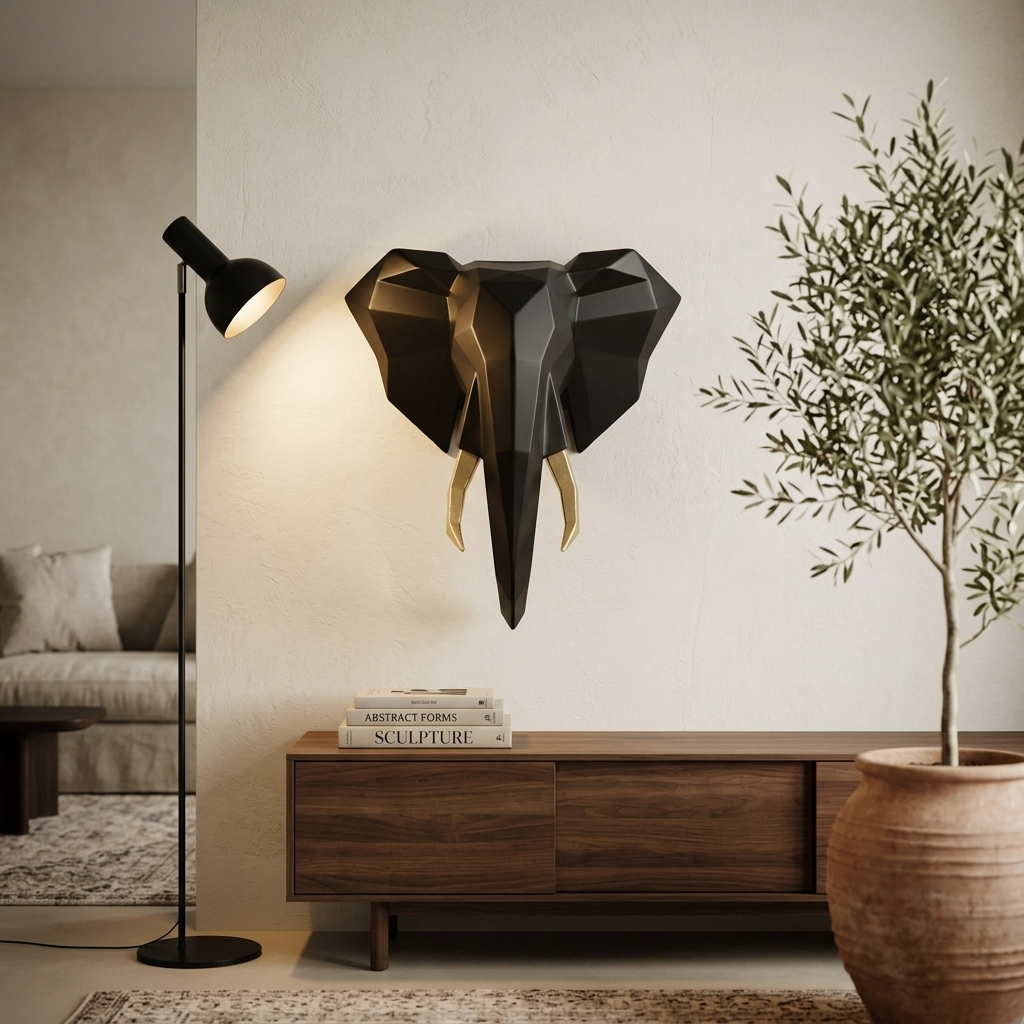 Elephante scultura da parete in acciaio con zanne in foglia oro - lifestyle