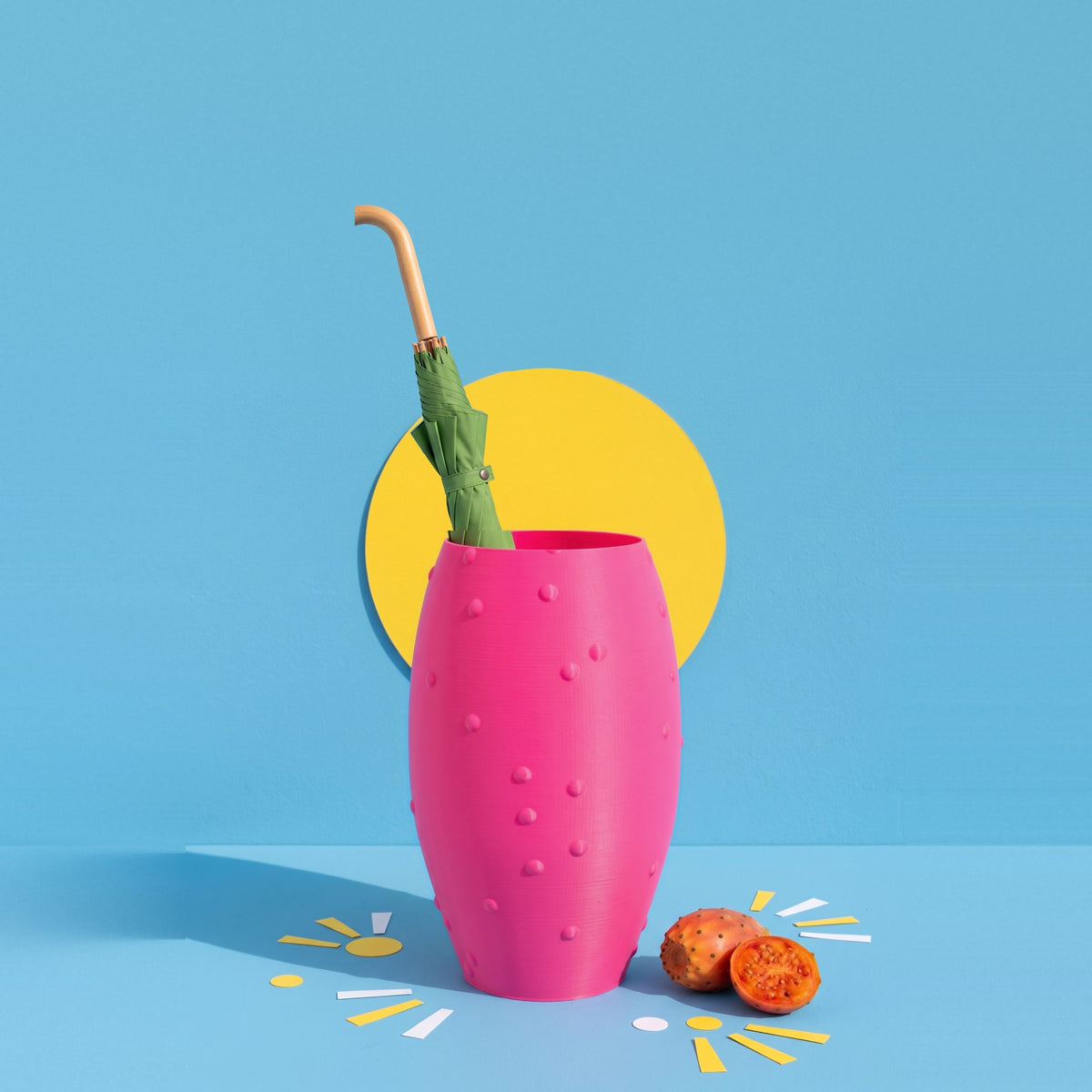 Portaombrelli Fico rosa fluo con un ombrello verde dentro, stampato in 3D – Scamarcia Design