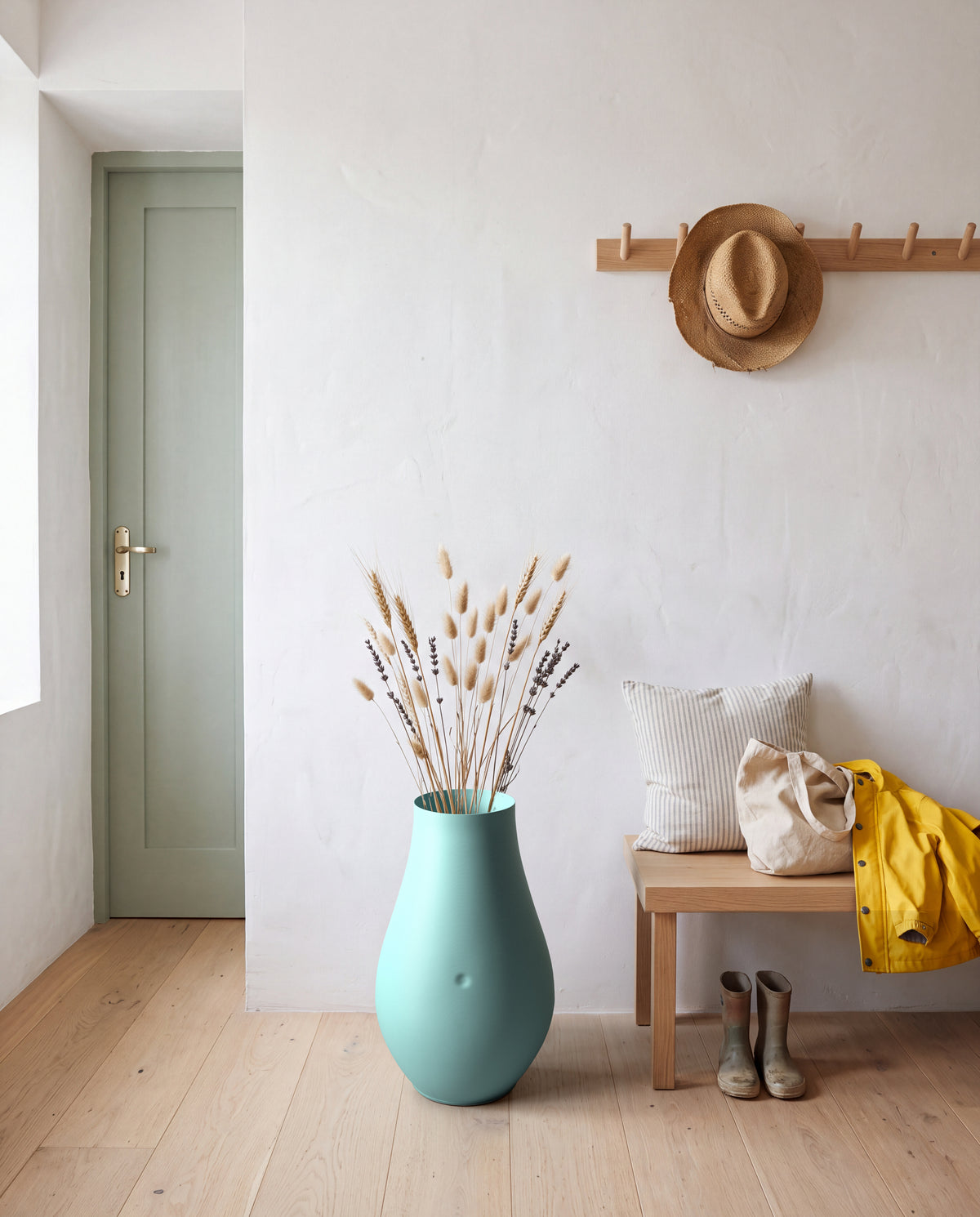Portaombrelli Iambe Scamarcia Design ambientato all'ingresso – colore Turchese